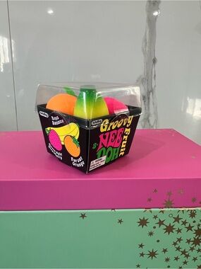 Needoh -Groovy NeeDoh Fruit Squeeze Toy Set - Neon Orange, Pink, Yellow, Green